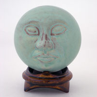 moon face sphere with luna glaze on ceramic base, esfera luna con esmalte luna sobre base ceramica