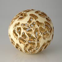 pierced ceramic sphere with animal print decor, esfera calada ceramica en diseo de piel animal