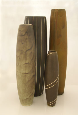 four tall ovoid vases with matt glaze, cuatro floreros ovalados con esmalte mate