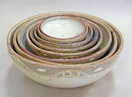 set of nine stoneware footed bowls with earth colors, juego de 9 jicaras en alta temperatura color tierra